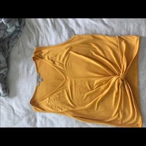 yellow knotted tank